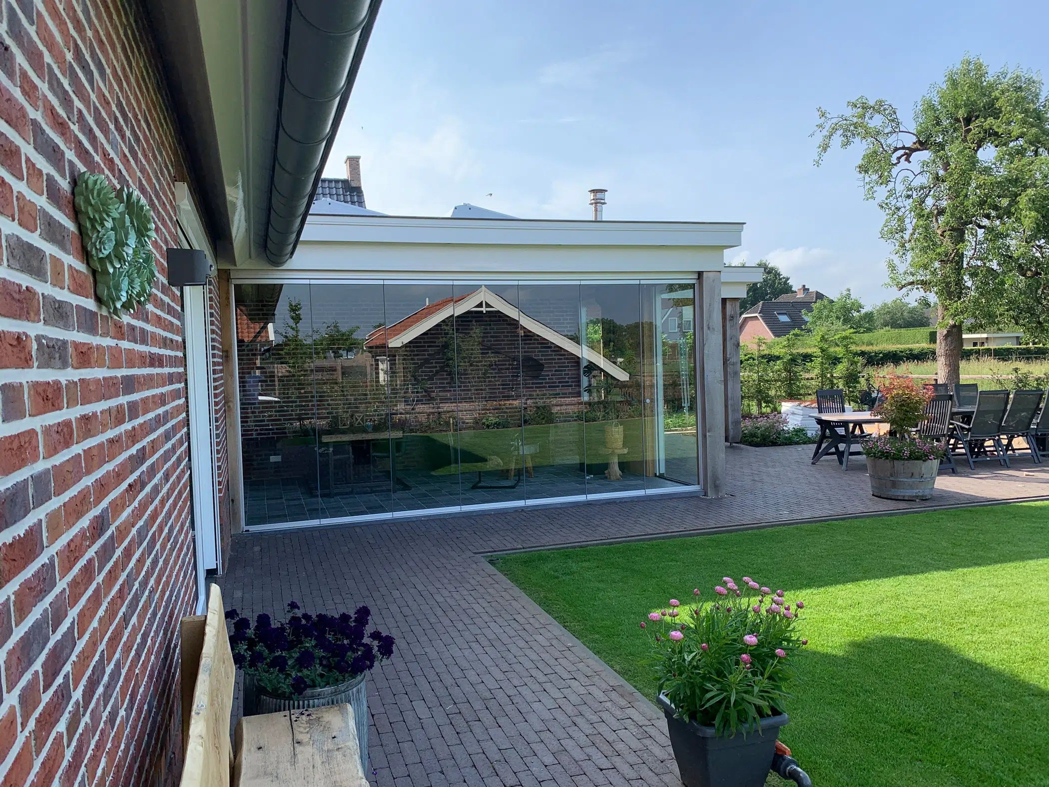Glaswandsystem rahmenlos für Terrassenanbau