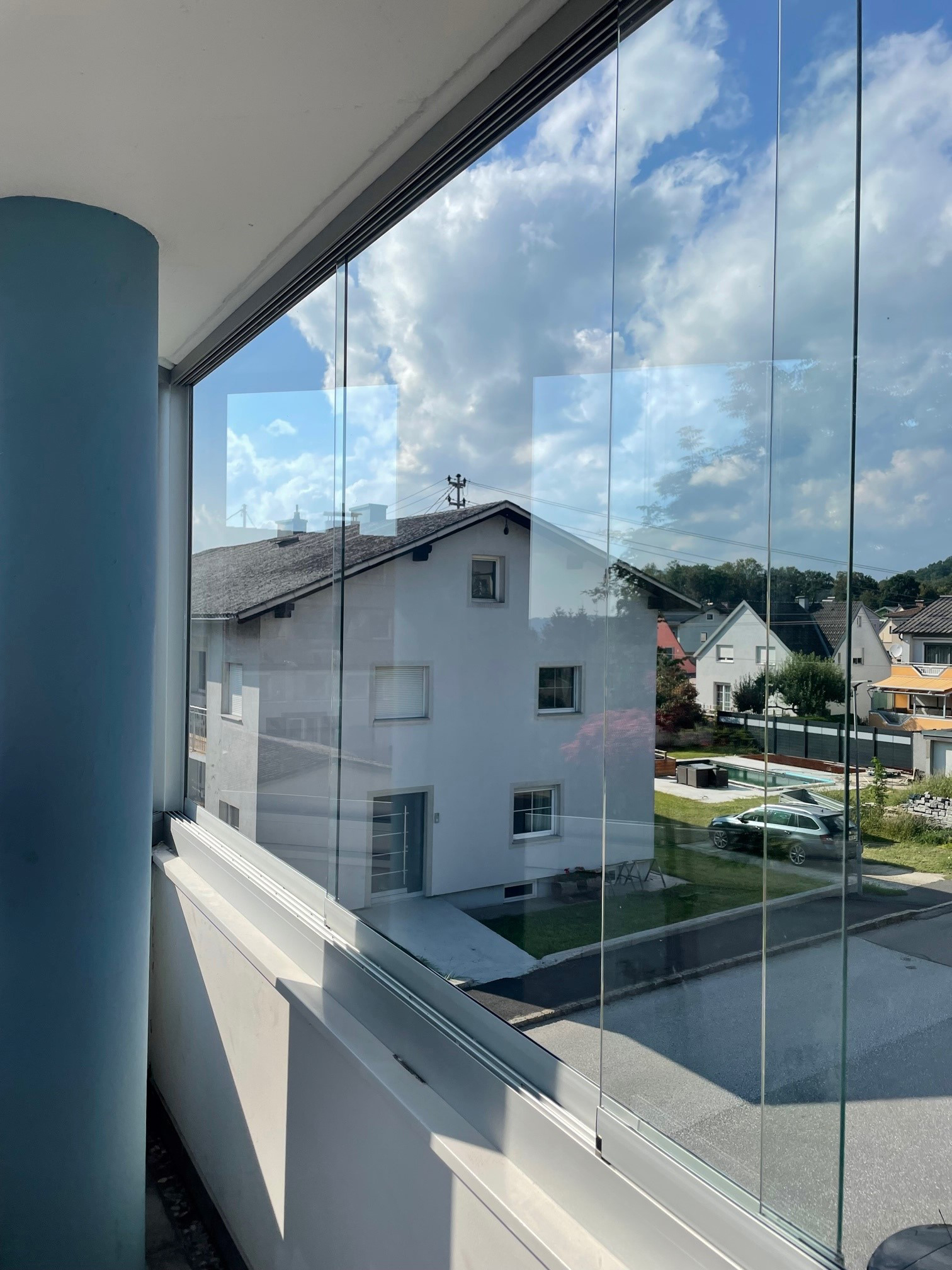Balkon Glasverbau mit Schiebe-Gläsern nach Maß