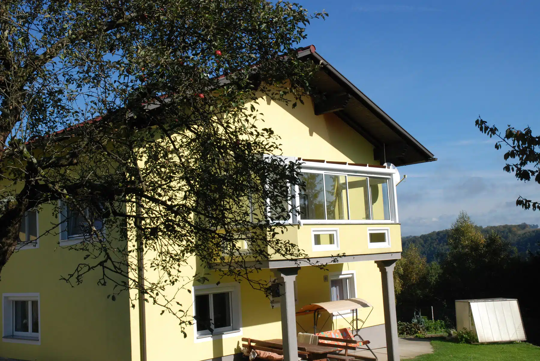 Balkon zum Wintergarten machen