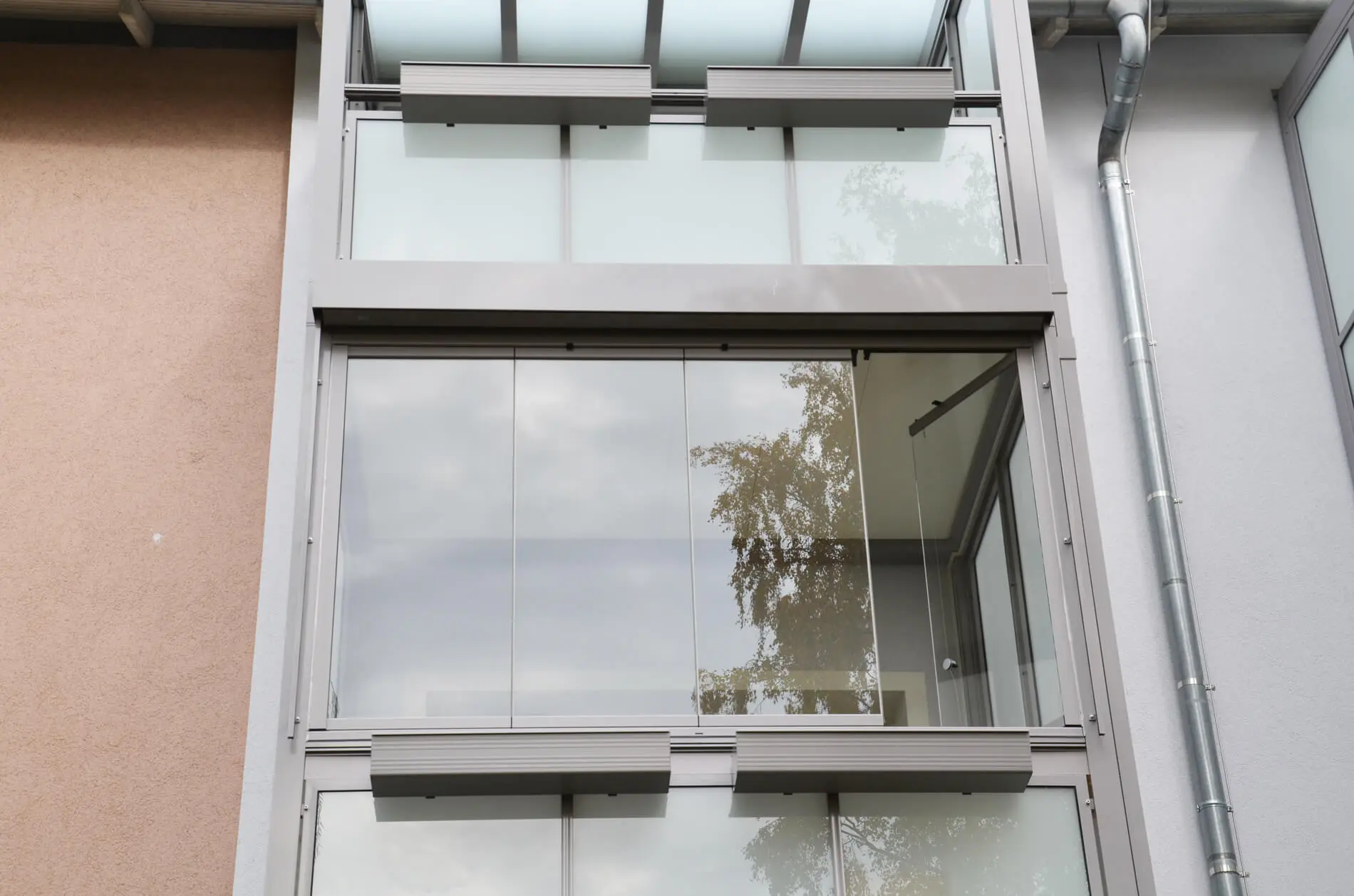 Balkonverbau mit Glas