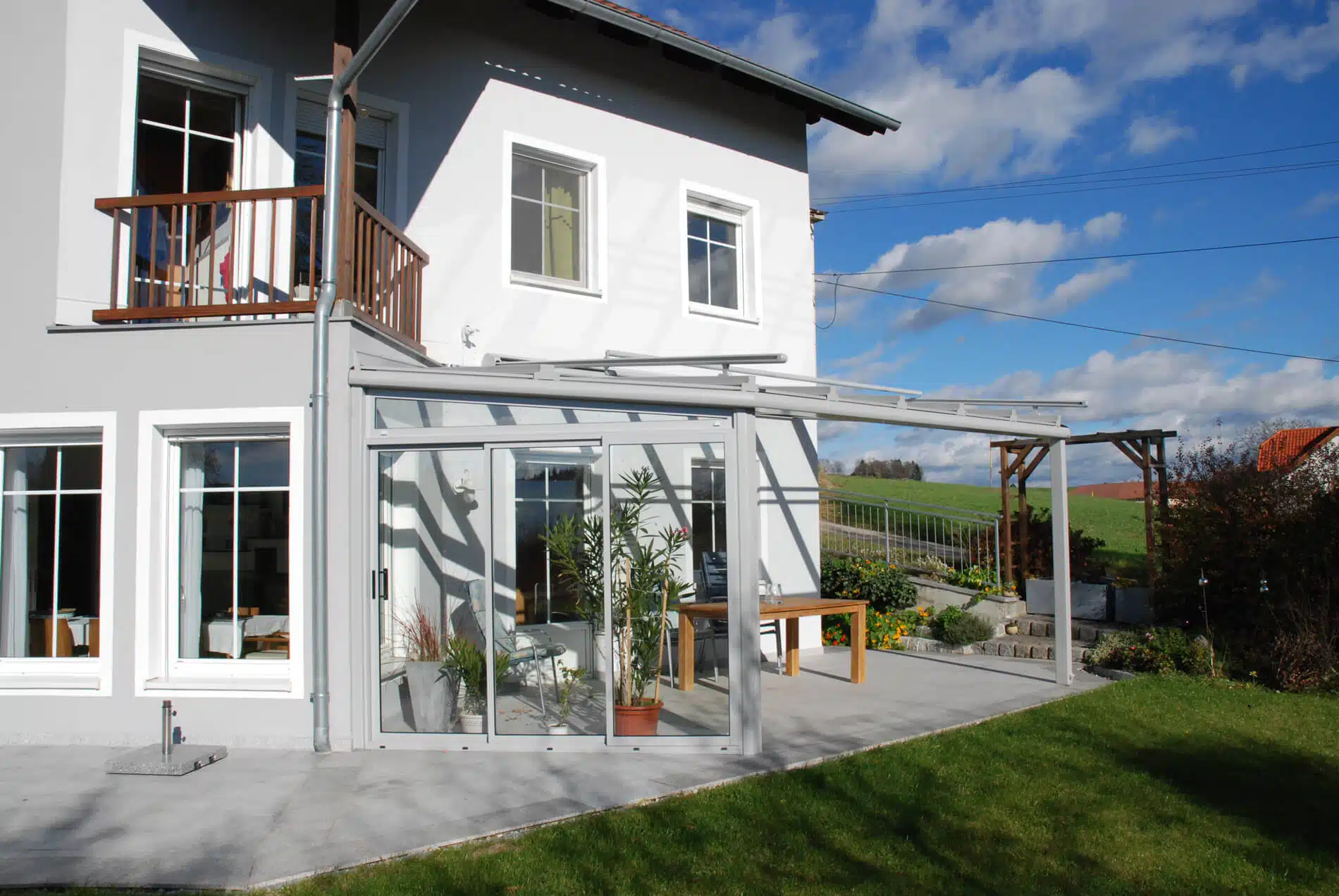 Glasschiebetür für Terrassenüberdachung in Alu Glas