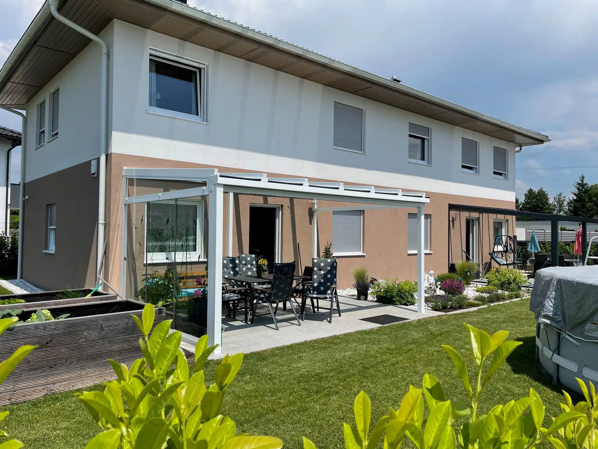 Schmidinger Terrassenüberdachung mit Glas und Seitenwand