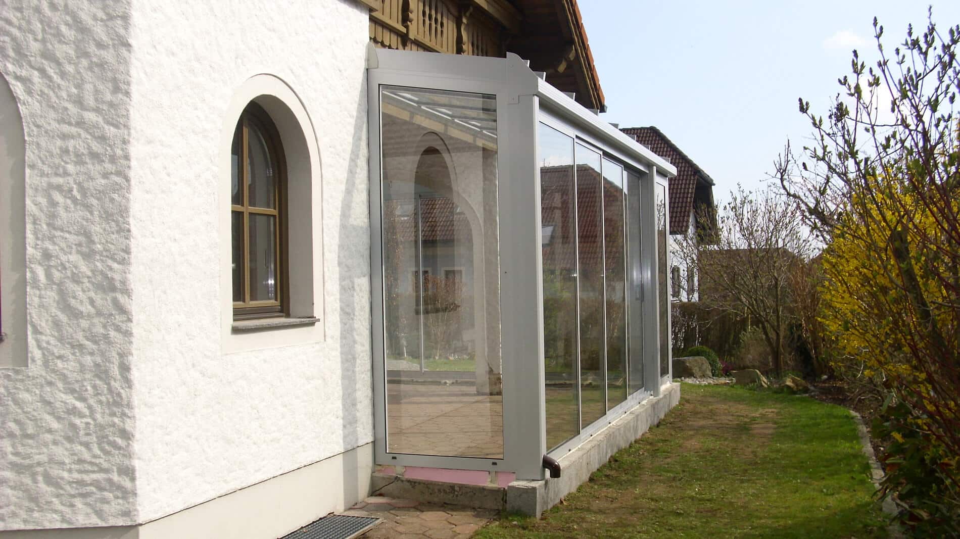 Wintergarten als Anbau an Einfamlienhaus