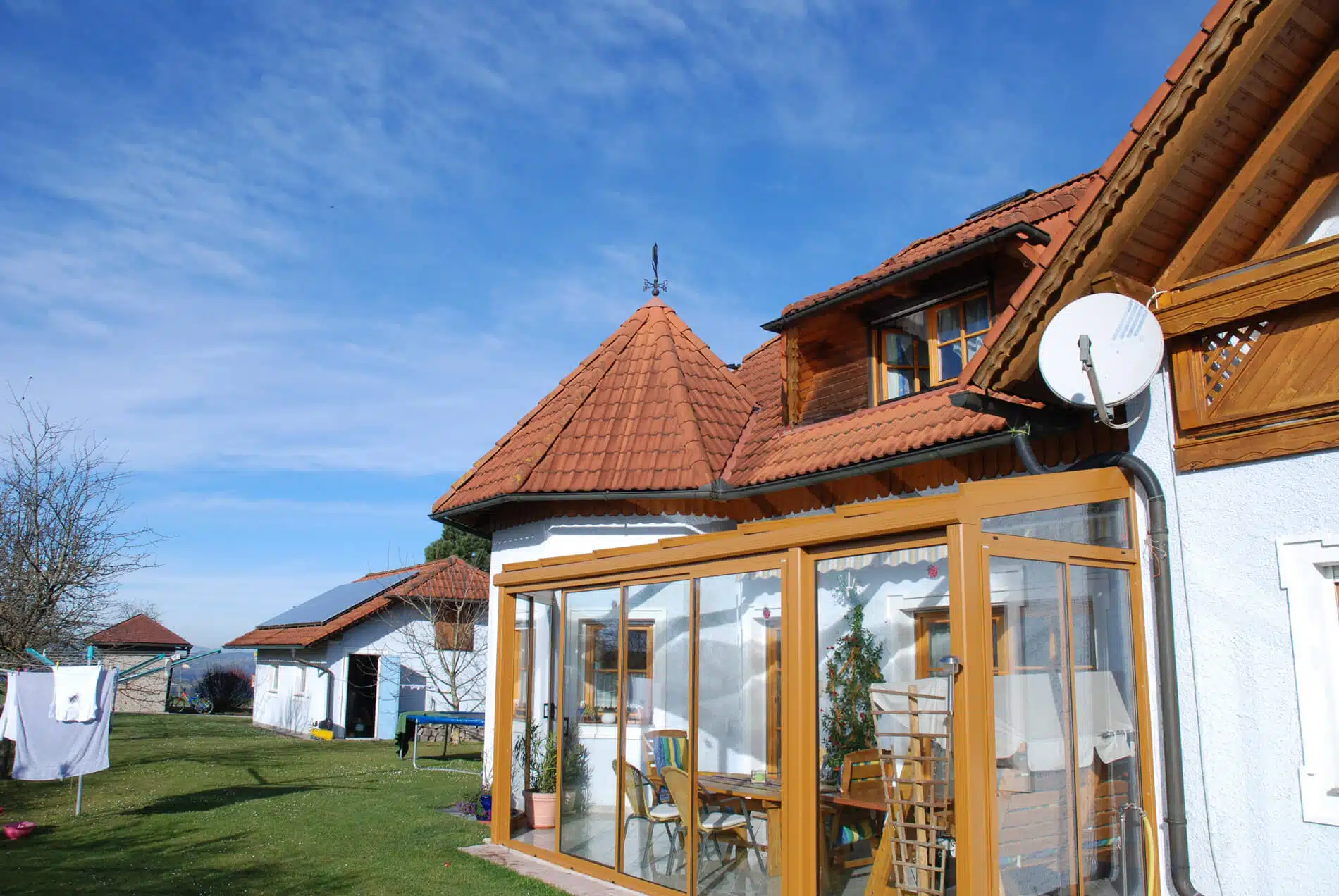 Wintergarten mit Alu Schiebetüren und Glas