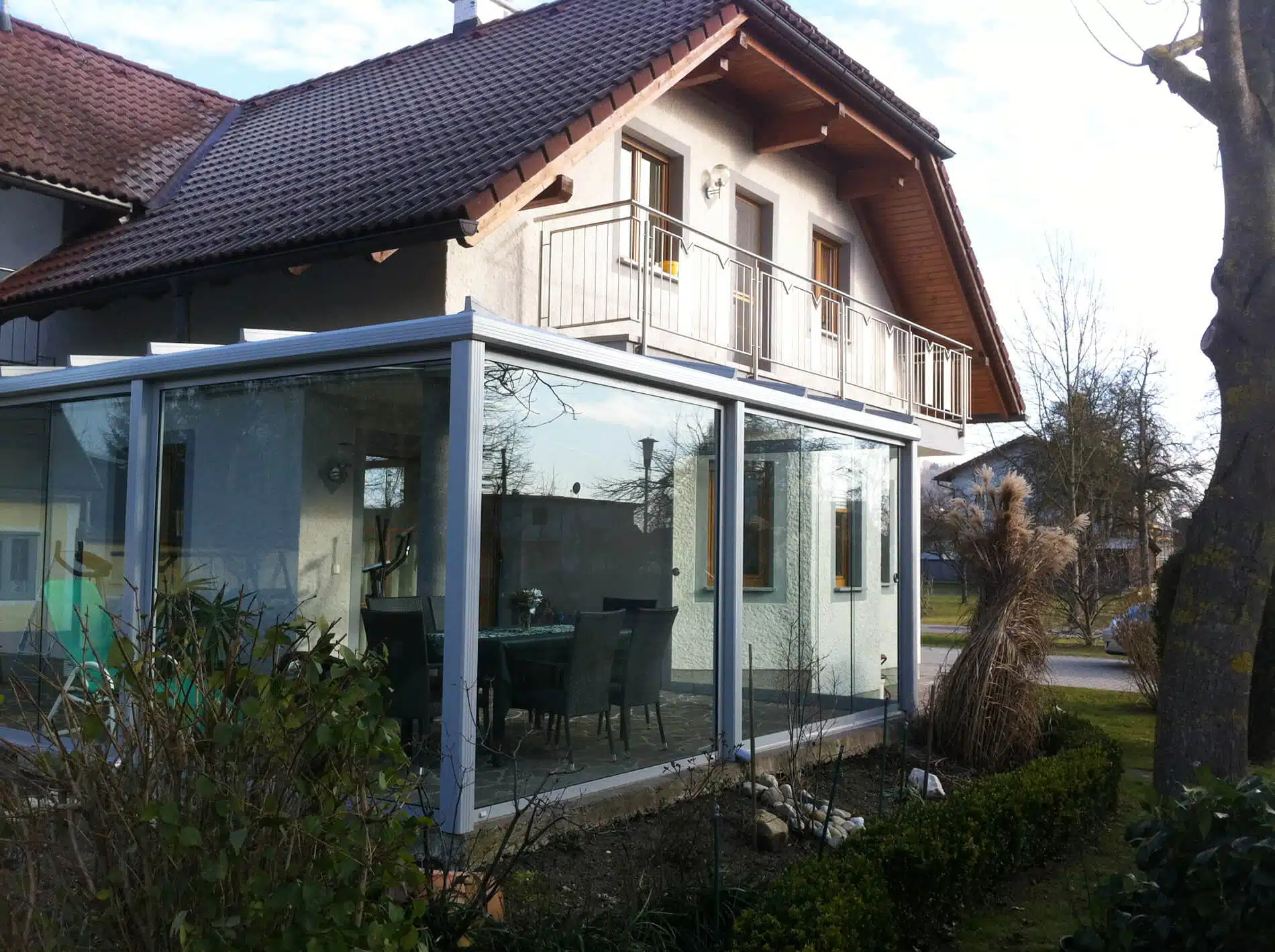 Wintergarten mit Balkon darüber