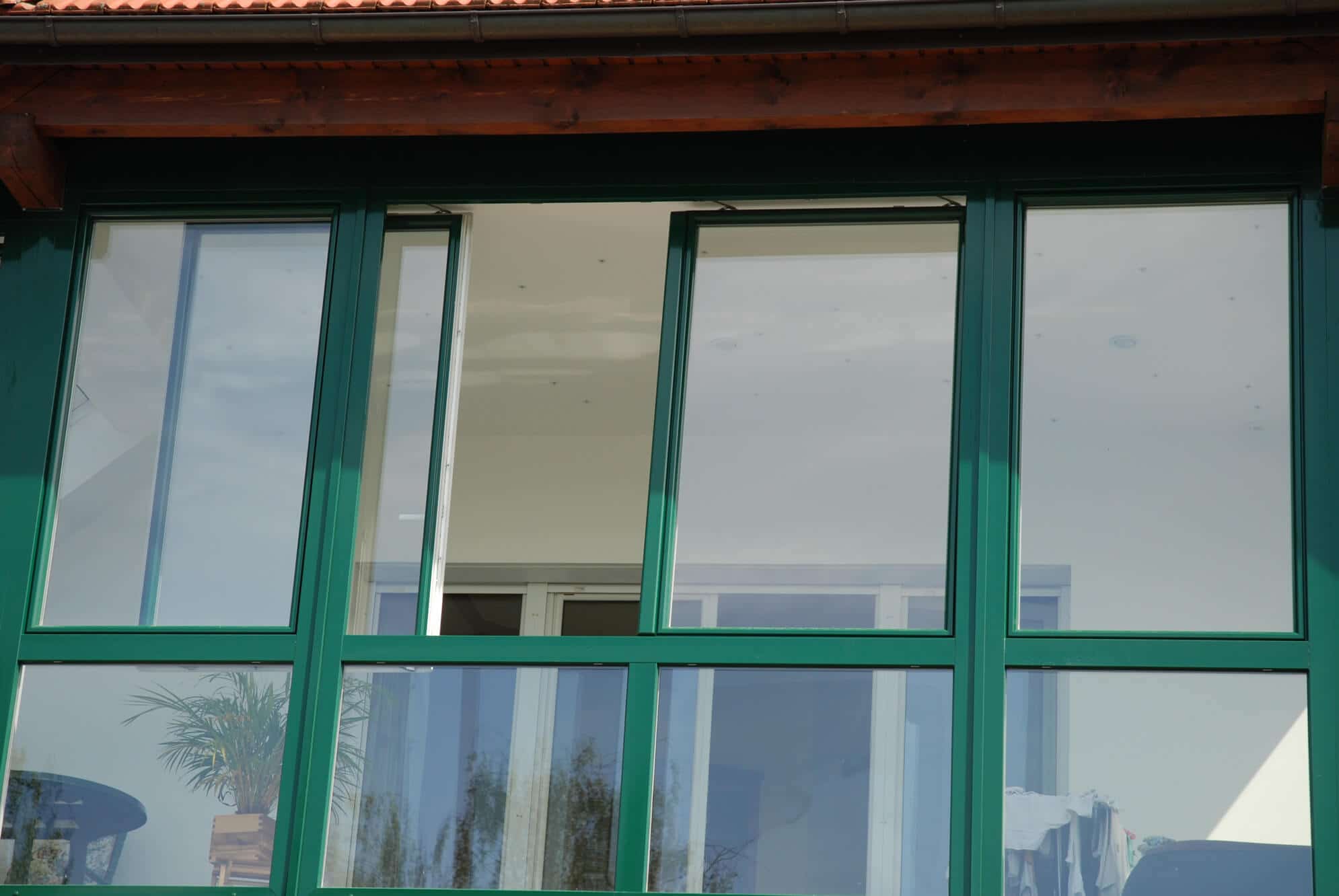 Wintergarten mit Schiebefenster Kunststoff-Alu