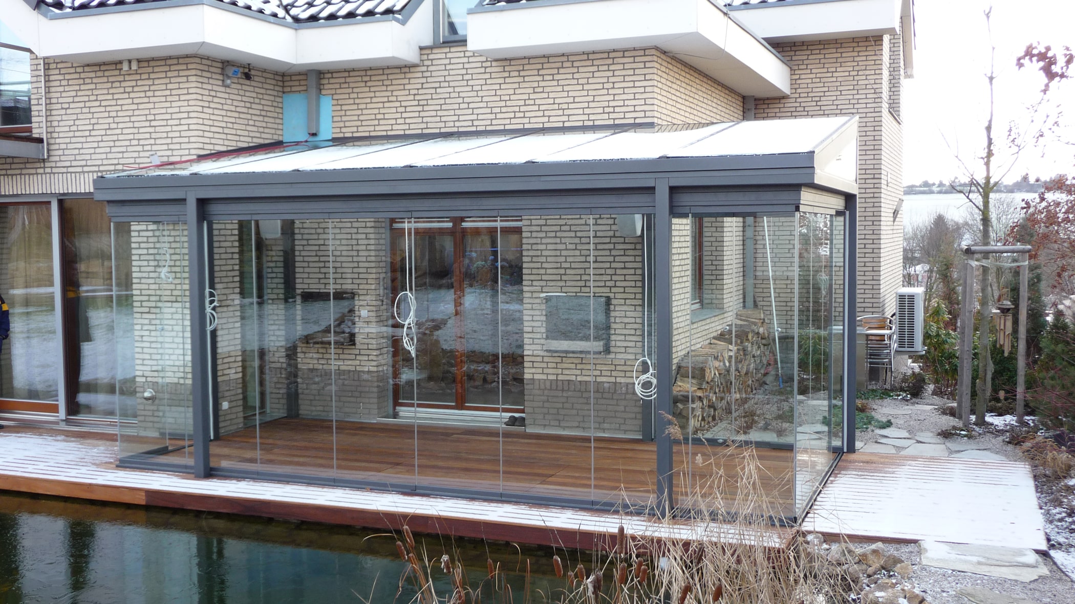 Wintergarten mit Sunflex Schiebe-Dreh-Verglasung