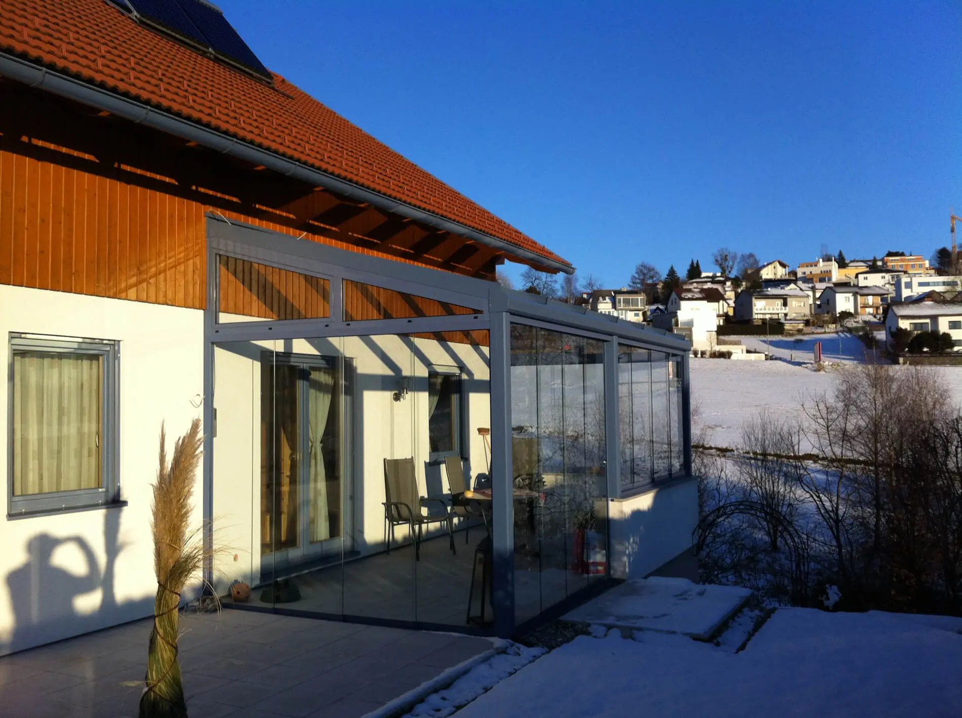 Wintergarten Pultdach mit Glasschiebetüren